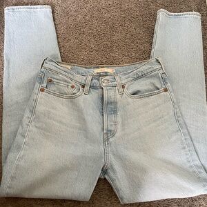 Light wash Levi’s straight jeans